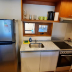 Amplia sala estar y cocina completamente departamento argentina
